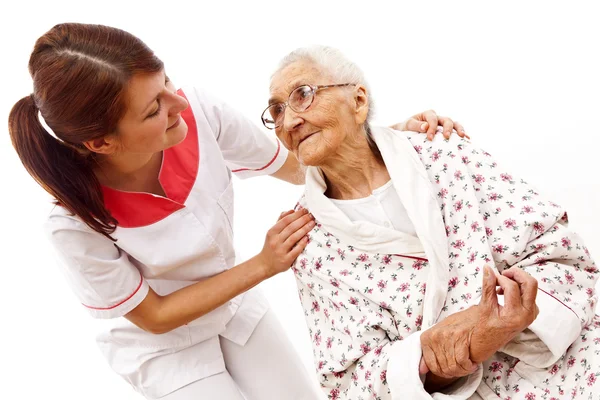 Medical care for an old woman — Stock Photo, Image