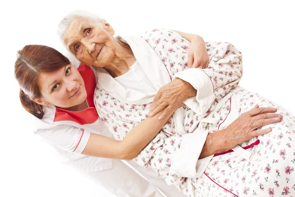 Medical care for an old woman — Stock Photo, Image