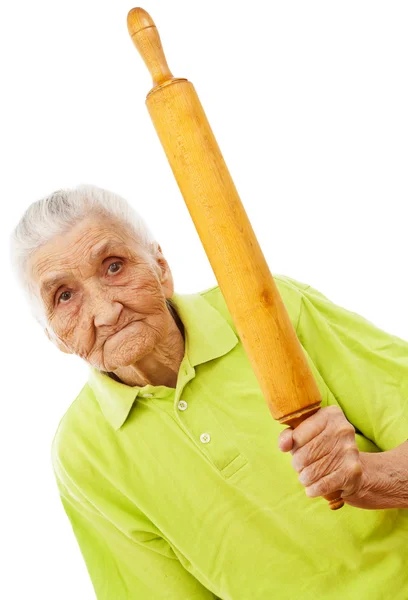 Angry old woman threatening with a rolling pin — Stock Photo, Image
