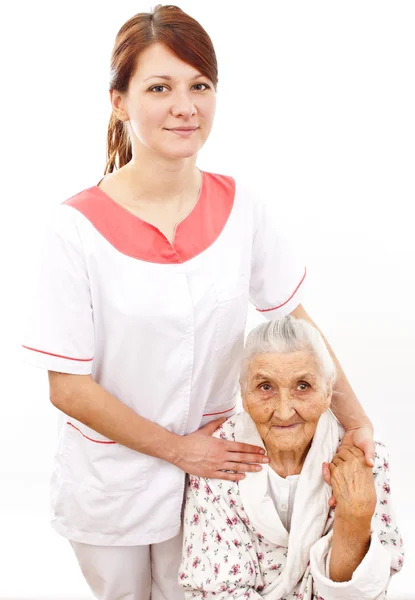 Medizinische Versorgung einer alten Frau — Stockfoto