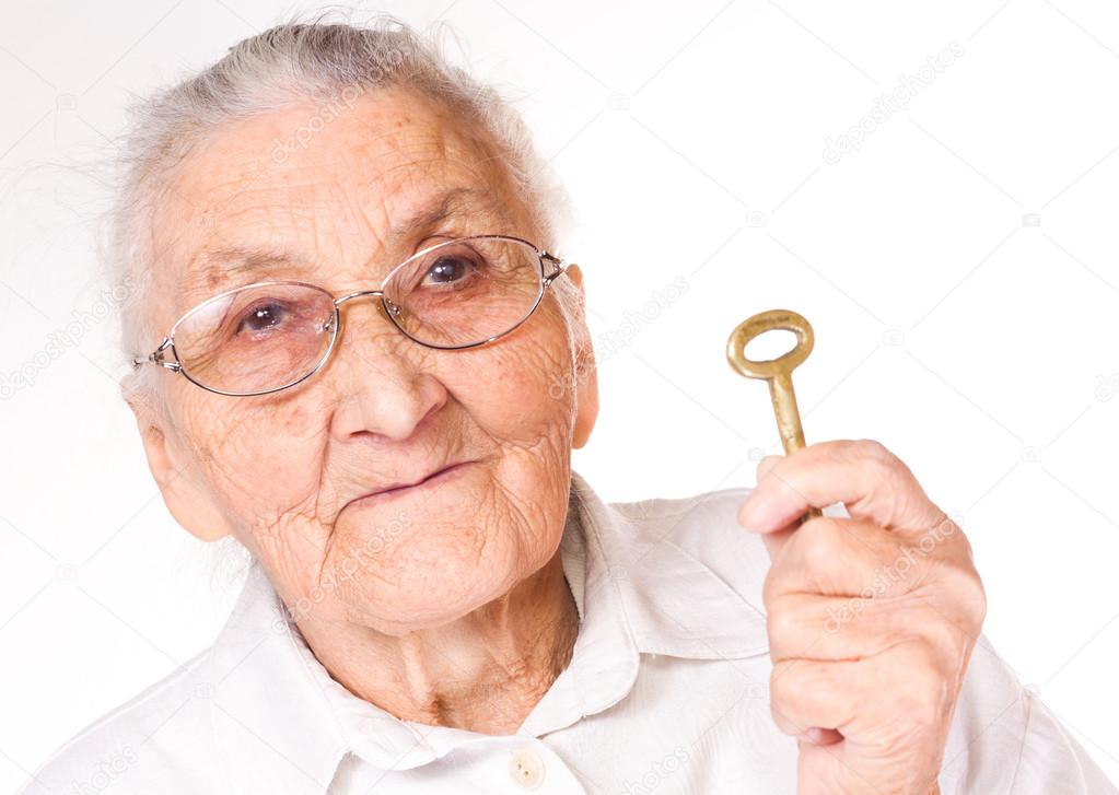 old lady with a key in her hand