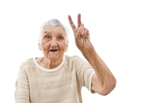 おばあちゃんは平和を示しています — ストック写真