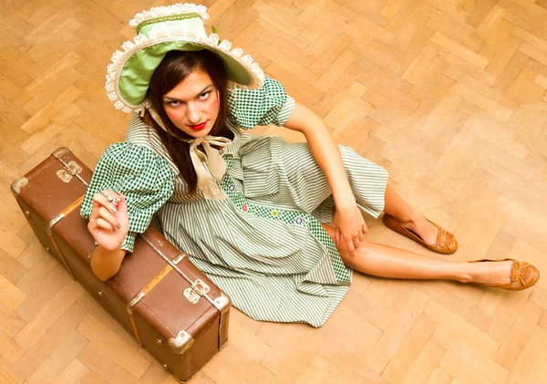 Girl with suitcase in retro style — Stock Photo, Image