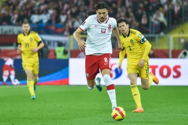 CHORZOW, POLAND - 29 Mart 2022 FIFA Dünya Kupası 2022 KALİFİFİKASYONLAR KALİFİKASYONU POLAND İÇİN 2: 0. Eylem halinde Jakub Moder.