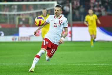 CHORZOW, POLAND - 29 Mart 2022 FIFA Dünya Kupası 2022 KALİFİFİKASYONLAR KALİFİKASYONU POLAND İÇİN 2: 0. Aslında Sebastian Szymanski.