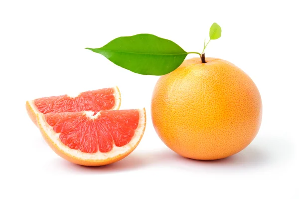 Ripe grapefruit with slices — Stock Photo, Image