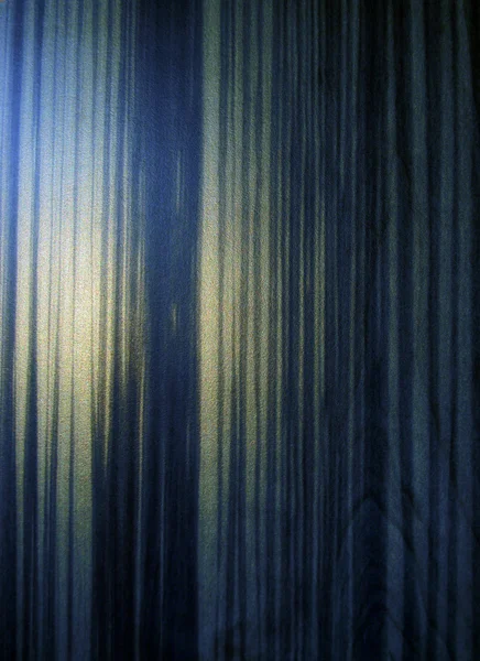 Fotografia de detalhes abstratos de sombras e luzes sobre fundo de madeira azul — Fotografia de Stock