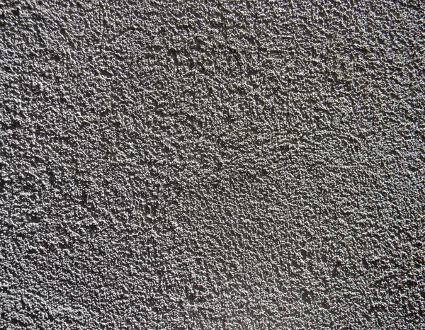 Macro fotografia de textura de parede cinza concreto — Fotografia de Stock