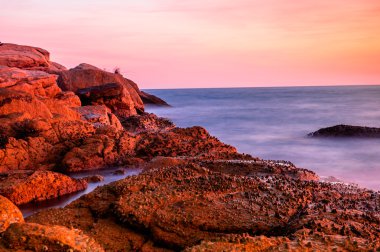 Gün batımında kumsal