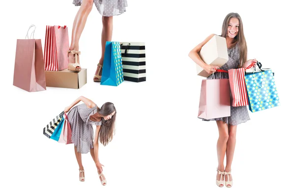 Mujer joven con bolsas aisladas fondo blanco — Foto de Stock