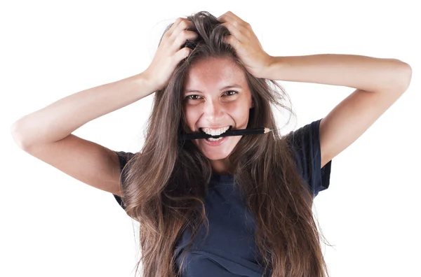 Mujer sosteniendo lápiz en sus dientes — Foto de Stock