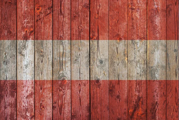 Austrian flag on old wooden background