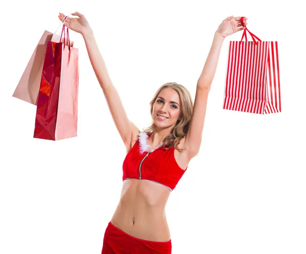 Glücklich lächelnde Frau in Weihnachtsmannkleidung mit Geschenkschachtel. — Stockfoto