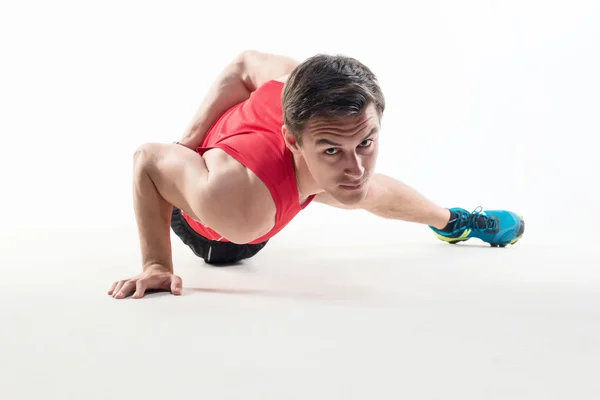 Sexy Young fashion sport muscle man, fitness model guy making push ups one hand exercise — Stock Photo, Image
