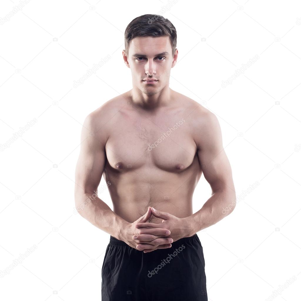 Portrait of an attractive athlete sportsman muscular handsome sexy guy in sport dress, strong man, naked  torso