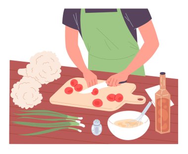 Adam domatesleri doğradı, yemek hazırladı.