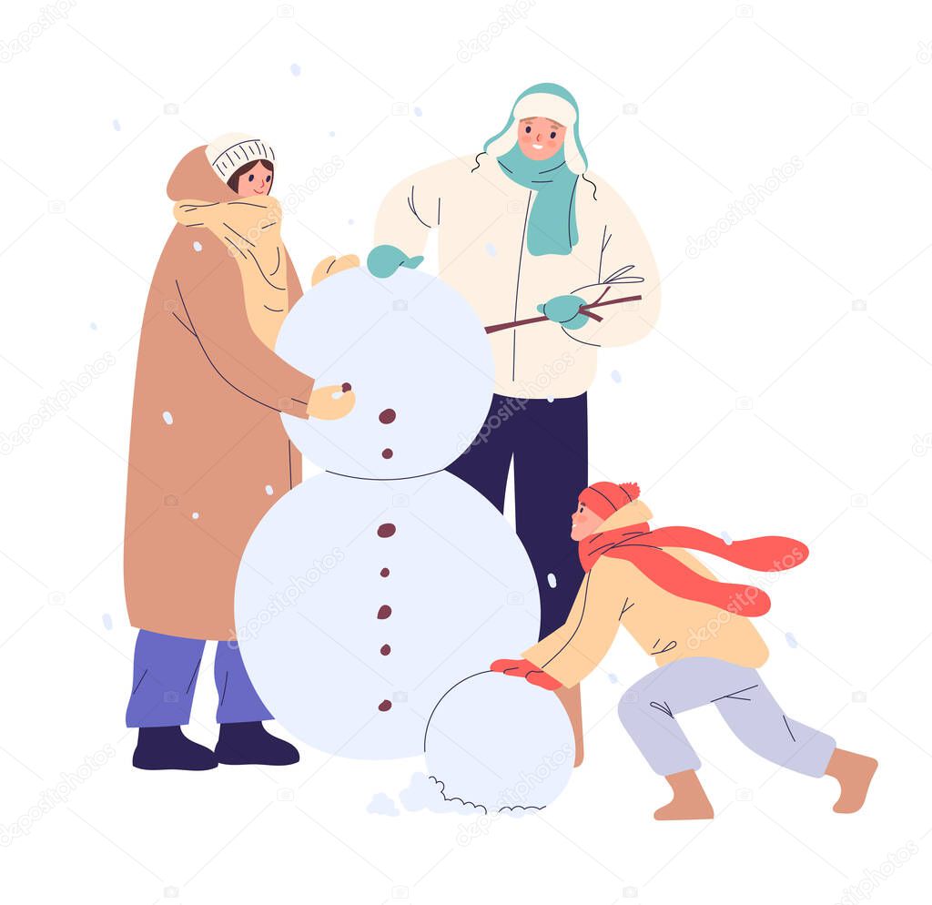 Portrait of happy family building snowman in winter