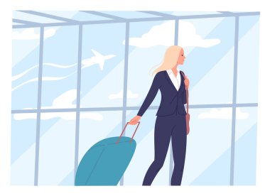 Genç bir kadın elinde bavulla havaalanından geçiyor.