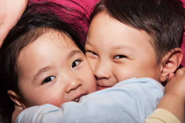 Brother and sister in pajamas — Stock Photo, Image