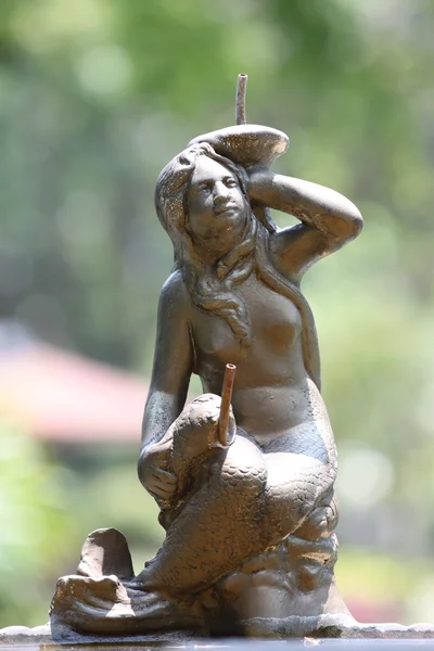 Statue of a woman,As a fountain. — Stock Photo, Image