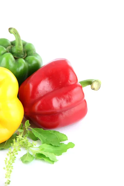 Eine Paprika drei Farben auf weißem Hintergrund. — Stockfoto