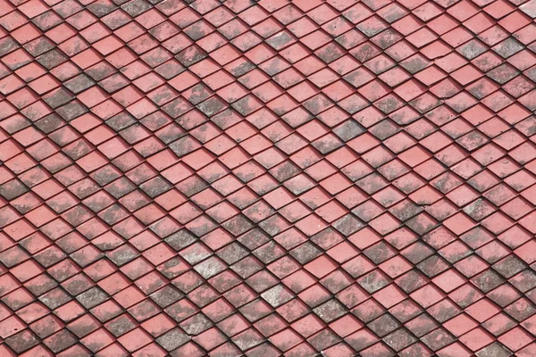 Röda gamla kakel tak. — Stockfoto