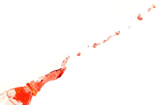 The Red water that spread out from the bottle. — Stock Photo, Image