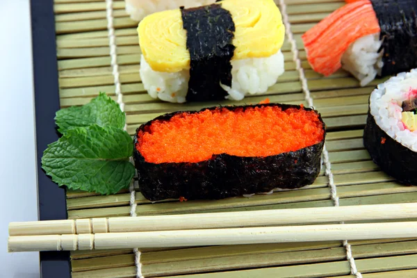 Seafood Sushi on a bamboo dish. — Stock Photo, Image