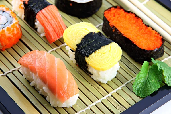 Sushi made form Tuna fish on a bamboo dish. — Stock Photo, Image
