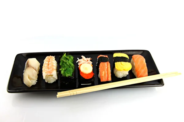 Seafood Sushi em um prato preto . — Fotografia de Stock