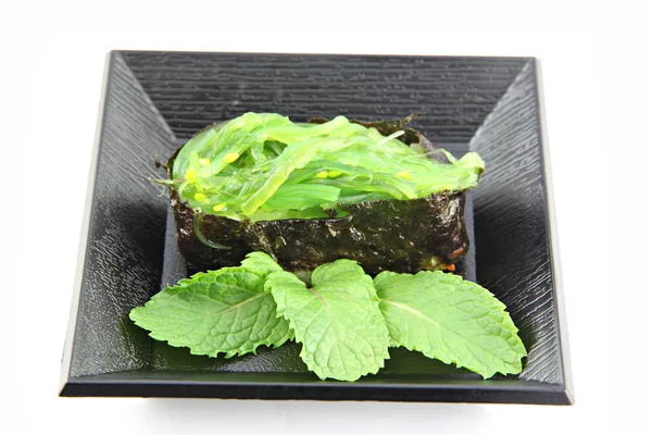 Green Seaweed Sushi on the dish. — Stock Photo, Image