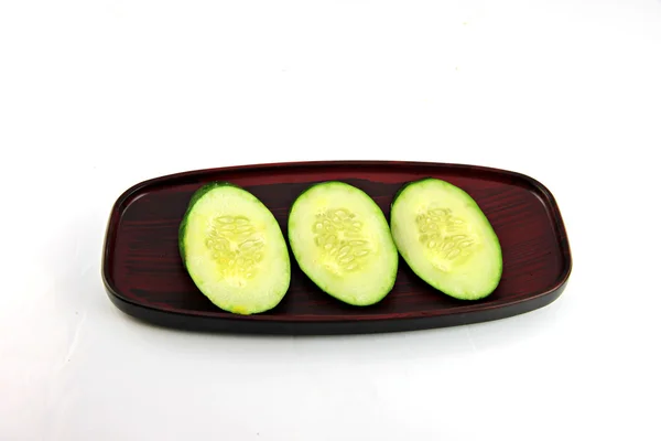 Cucumber slices placed in a dish. — Stock Photo, Image