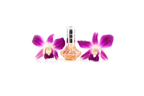 Orchid en oranje paars parfum flessen. — Stockfoto