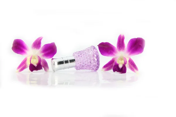 Purple orchid and Purple Perfume bottles. — Stock Photo, Image