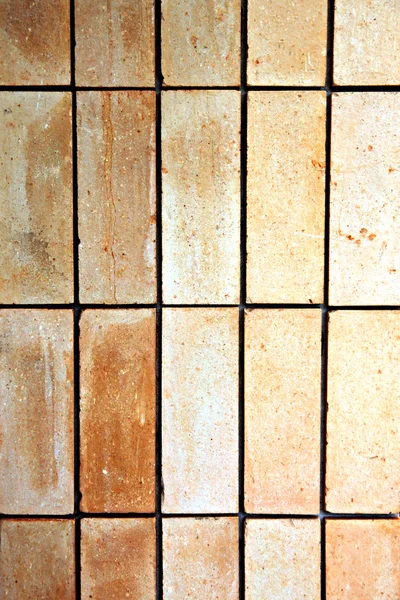 Old stone tile floor is a rectangular cloth. — Stock Photo, Image