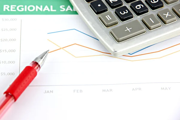 Pen resting on a Sales graph. — Stock Photo, Image