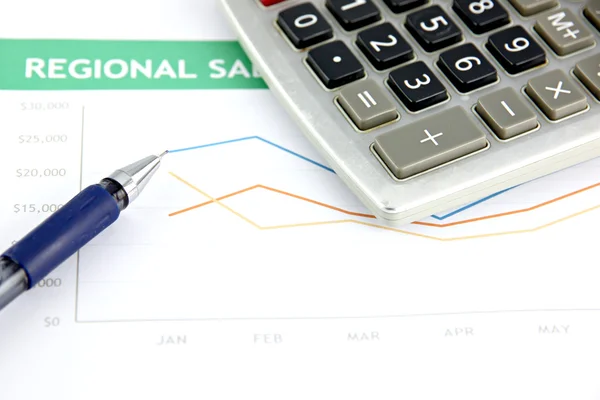 Pen resting on a Sales graph. — Stock Photo, Image