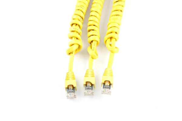 三个黄色的 lan 电缆. — 图库照片
