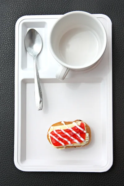 Donut like sushi on white dish. — Stock Photo, Image