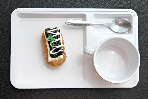 Donut like sushi on white dish. — Stock Photo, Image
