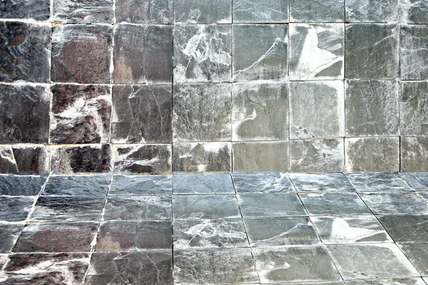 Muur en vloeren van grijze steen. — Stockfoto