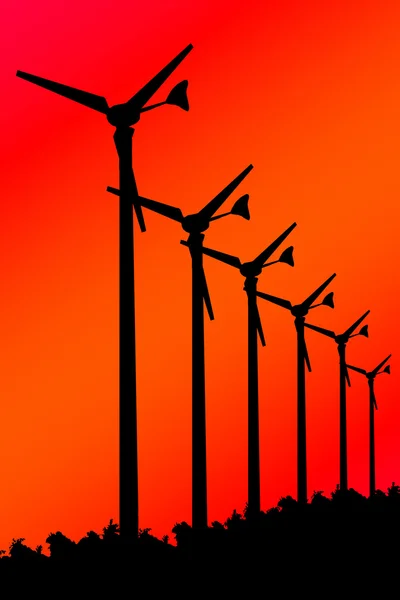 Silhouet windturbines op rode achtergrond. — Stockfoto