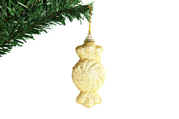 Golden candy hanging on branch Christmas tree. — Stock Photo, Image