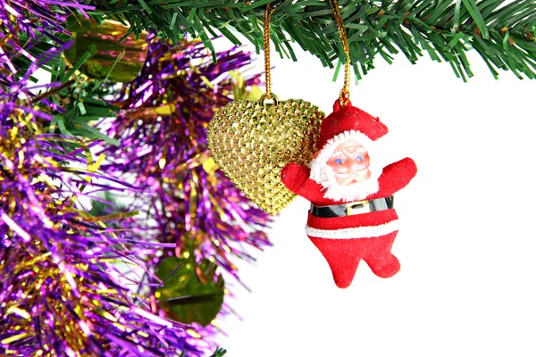 Santa colgando en el árbol de Navidad . — Foto de Stock