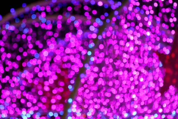 Picture blurred with purple bokeh at night. — Stock Photo, Image