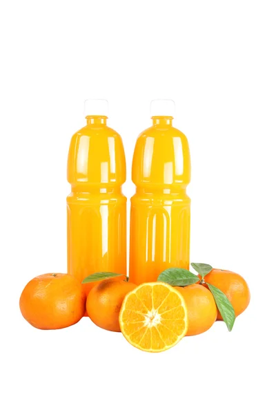 小蜜橘和瓶果汁. — 图库照片