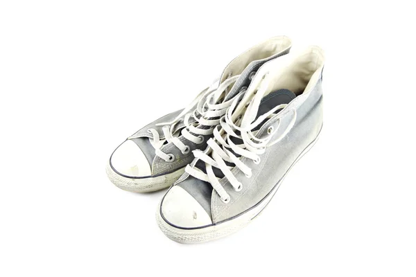 Dirty gray sneaker isolated. — Stock Photo, Image