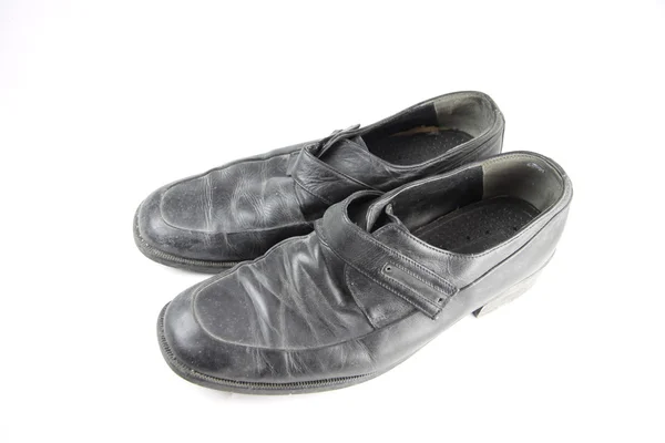 Stare skórzane buty na białym tle. — Zdjęcie stockowe