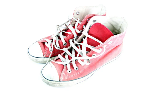Izole kirli kırmızı spor ayakkabı. — Stok fotoğraf