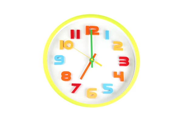 Colorful clock in telling time of seven o'clock. — Stock Photo, Image